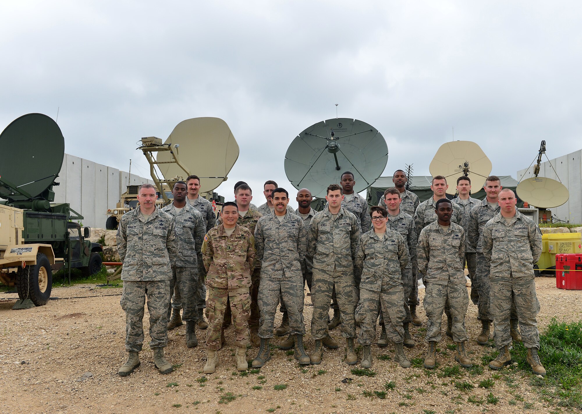 Airmen from the 1st Combat Communications Squadron, 52nd CBCS and soldiers from the 44th Expeditionary Signals Battalion work together to support U.S. European Command exercise Juniper Cobra 16 in Israel, March 3, 2016. Juniper Cobra uses ballistic missile defense computer simulations to train U.S. and Israeli service members while reinforcing a strong military relationship.