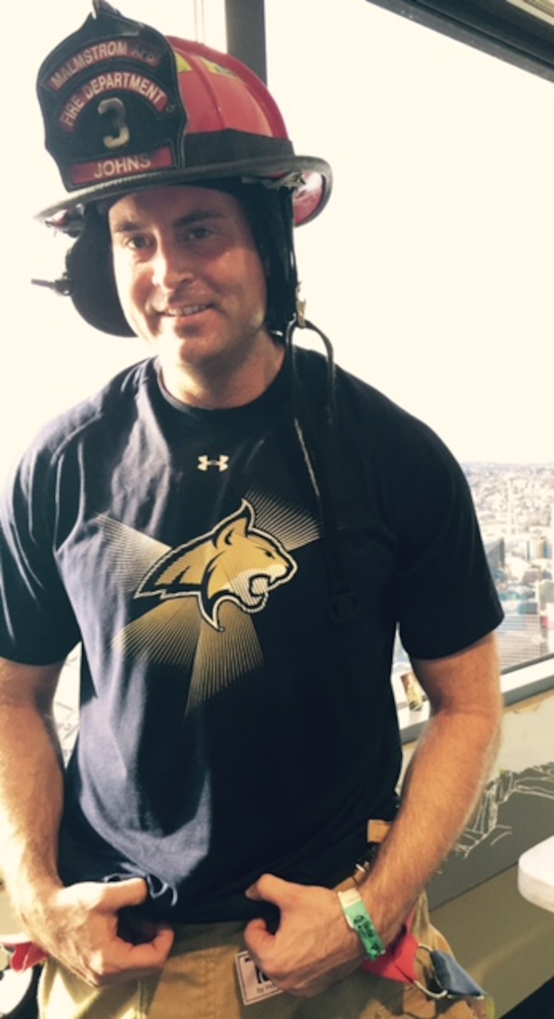 Scott Johns, 341st Civil Engineer Squadron fire and emergency services member, poses for a photo after completing the Scott Firefighter Stair Climb challenge, hosted at the Columbia Center in downtown Seattle Feb. 28, 2015. Johns competed against 1,935 firefighters from over 330 departments from around the world in a climb of 69 floors of stairs in full firefighting gear during the challenge. (Courtesy photo) 