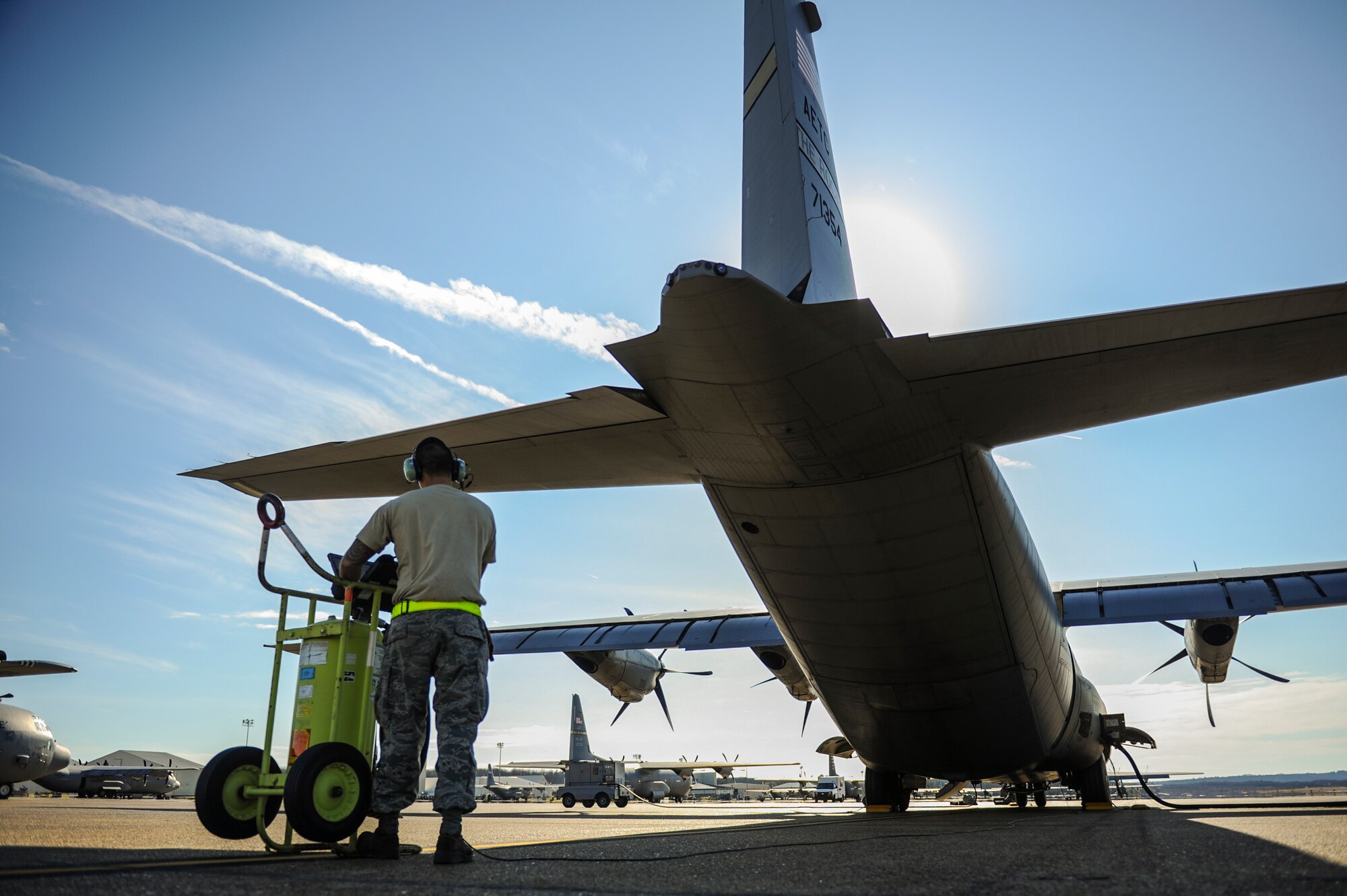 U.S. Air Force Senior Airman Michael Sakahara, a 314th Aircraft Maintenance Squadron C-130J crew chief, performs a component inspection on a C-130J March 2, 2016, at Little Rock Air Force Base, Ark. The Rock is home to the largest C-130 fleet in the world, 314th AMXS maintainers certify all aircraft are safe, functioning properly and ready to meet training and operational requirements. By providing mission ready aircraft, pilots in training receive essential flying hours that are necessary for graduation from the C-130 Center of Excellence.  (U.S. Air Force photo/Senior Airman Harry Brexel)