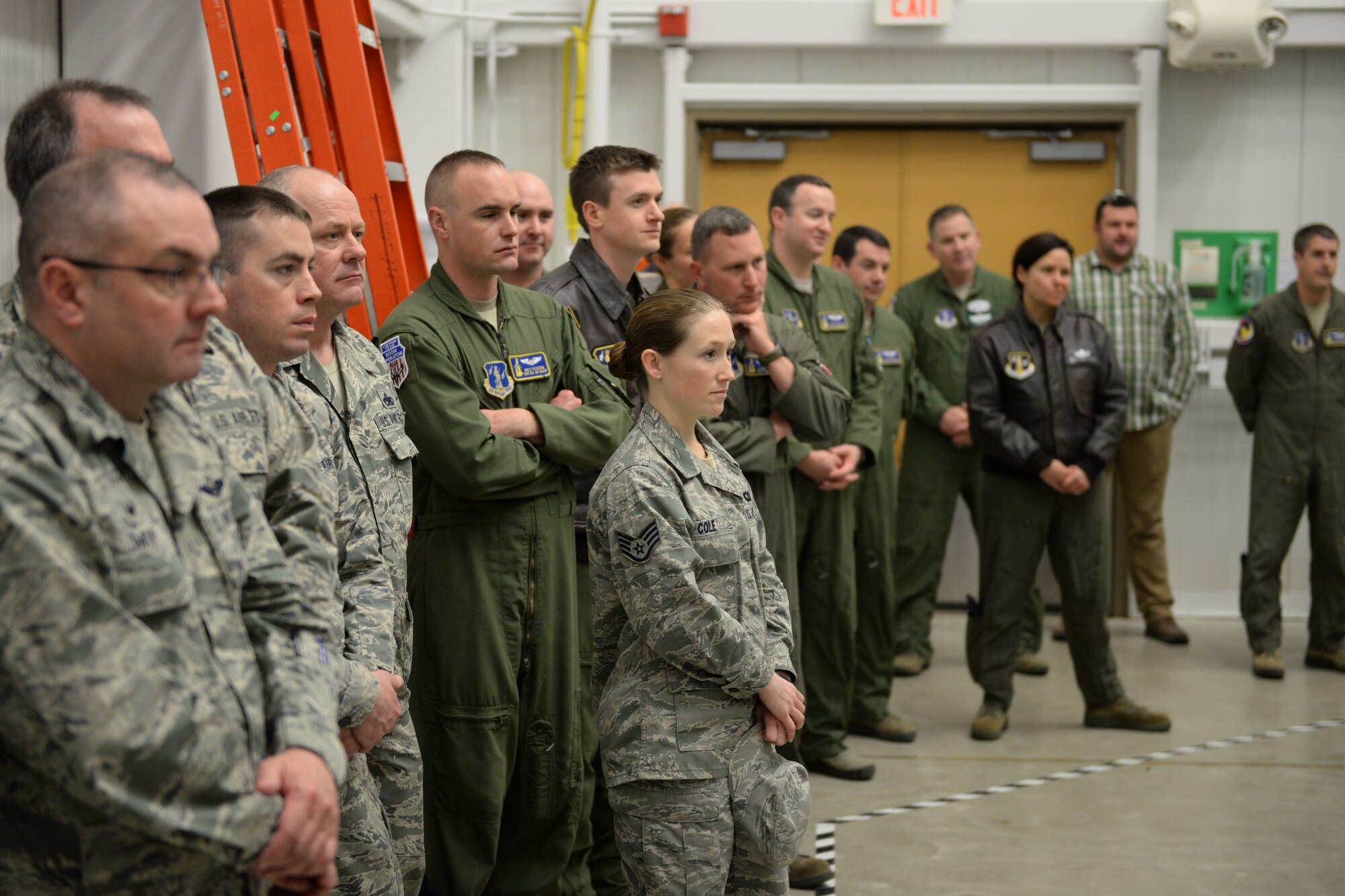 U.S. Airmen with the 157th Air Refueling Wing, New Hampshire Air National Guard attend an event marking the retirement of the KC-135 flight simulator from Pease Air National Guard Base, New Hampshire, March, 9, 2016.  The simulator is being retired to make way for a new KC-46 weapons trainer slated to arrive in the spring of 2017. (U.S. Air National Guard photo by Staff Sgt. Curtis J. Lenz)