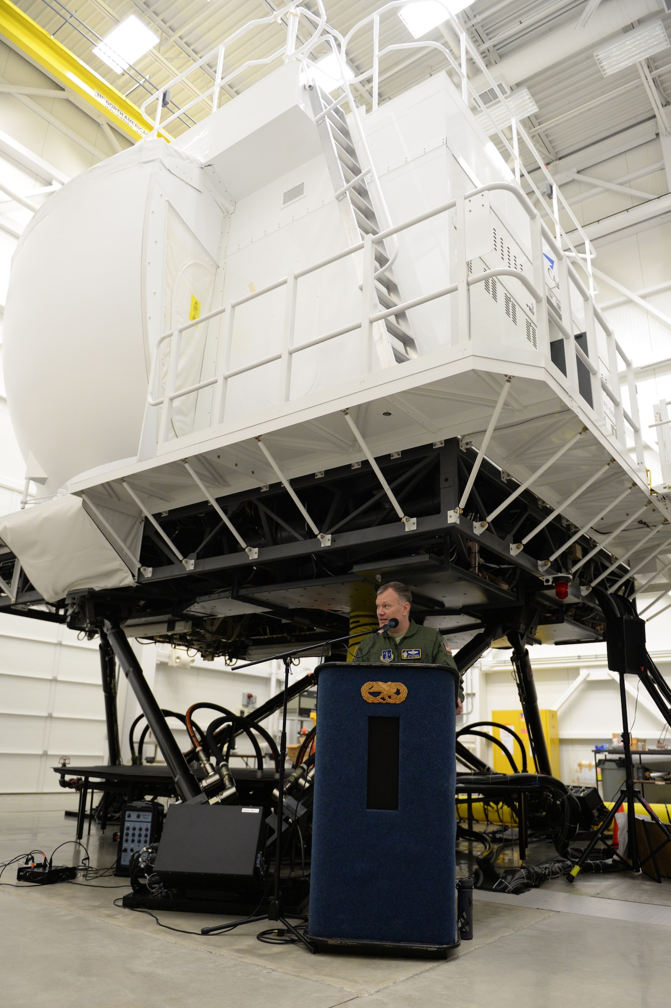 U.S. Air Force Colonel John Pogorek, 157th Operations Group commander, New Hampshire Air National Guard, speaks during the retirement of the KC-135 flight simulator from Pease Air National Guard Base, New Hampshire, March, 9, 2016.  The simulator is being retired to make way for a new KC-46 weapons trainer slated to arrive in the spring of 2017. (U.S. Air National Guard photo by Staff Sgt. Curtis J. Lenz)