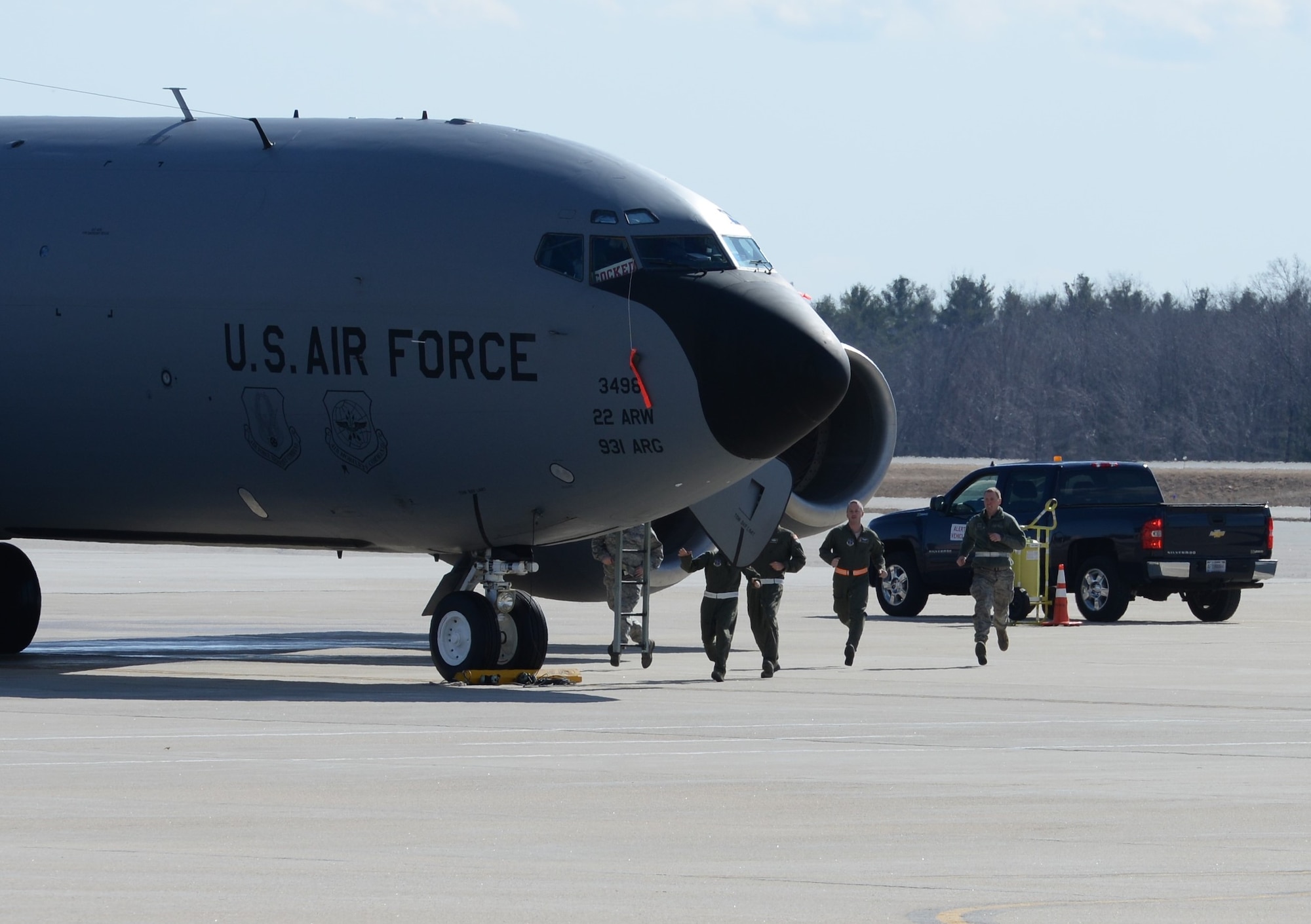 U.S. Airmen with the New Hampshire Air National Guard, scramble to a KC-135R Stratotanker during a training exercise, Pease Air National Guard Base, N.H., March 6, 2016. (U.S. Air National Guard photo by Staff Sgt. Curtis J. Lenz)