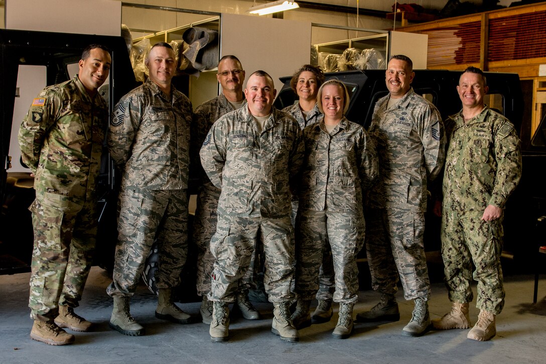U.S. Navy Fleet Master Chief Terrence I. Molidor, right, the command Senior Enlisted Leader for Headquarters, North American Aerospace Defense Command and United States Northern Command, speaks with members of the 139th Airlift Wing Homeland Emergency Response Force during a visit to the wing on Saturday March 5, 2016 in Saint Joseph, Mo.  (U.S. Air National Guard photo by Senior Airman Sheldon Thompson/Released)