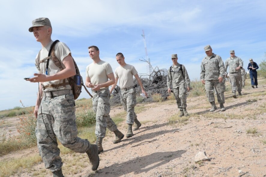 Airman 1st Class Tyler Casper, 56th Logistics Readiness Squadron vehicle operator, leads a group of Airmen from the 944th Fighter Wing and 56th Fighter Wing during a land navigation exercise as part of the Convoy Operational Readiness Training March 5, 2016. CORT training is a bi-annual requirement for LRS members and incorporates classroom instruction and a hands-on exercise. (U.S Air Force photo by Staff Sgt. Nestor Cruz)