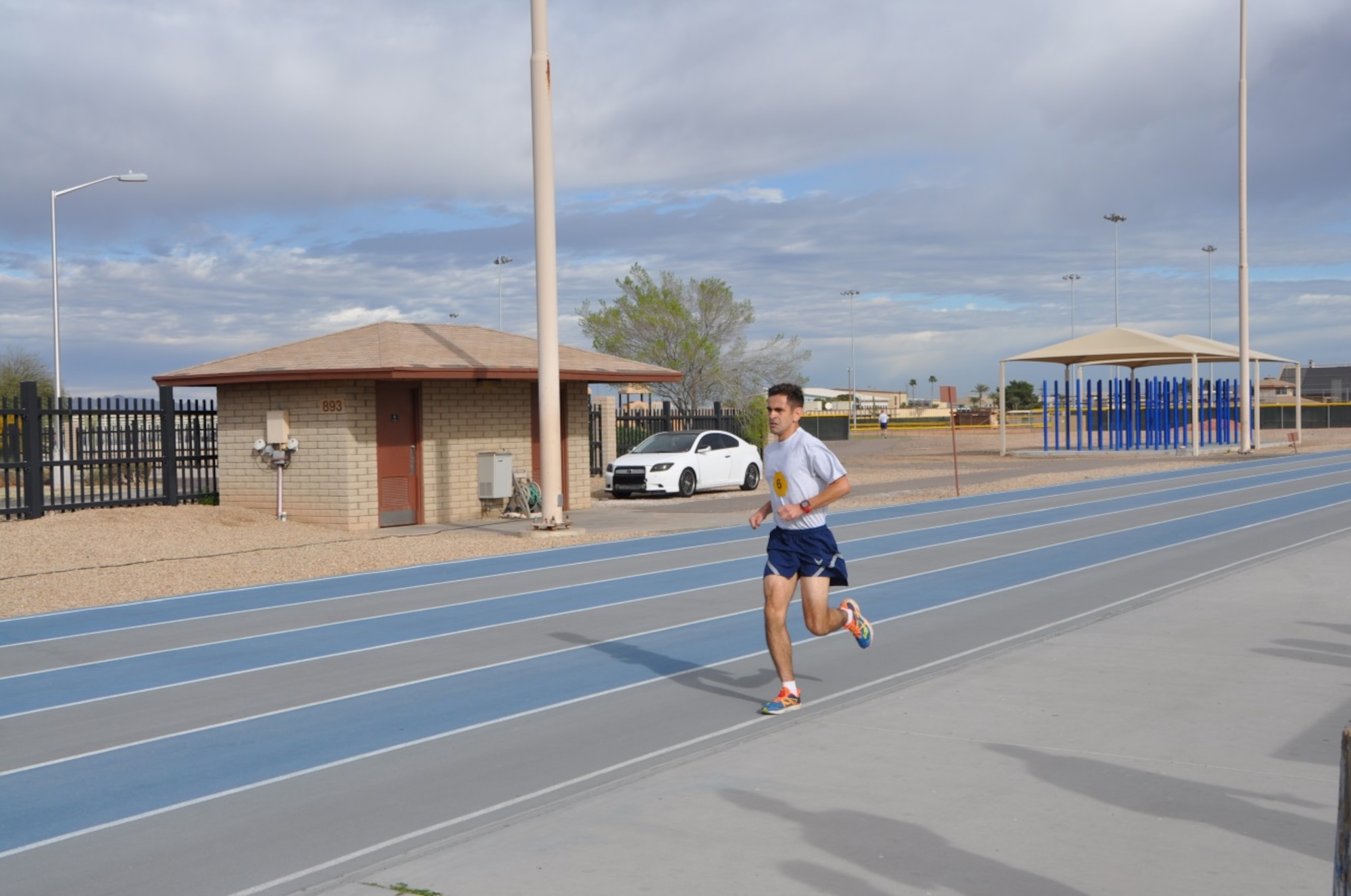 Staff Sgt. Christian Enriquez, 944th Fighter Wing Det. 1 Maintenance, F16 avionics craftsman, ran into the Luke AFB history books today.  Running 1.5 miles in 8:10 secured his success of beating the current record of 8:24 which was set at Luke on June 25, 2014. Originally from Chicago Ill., Enriquez began running 13 years ago as a freshman in high school and said it has always been something that he is good at. (U.S. Air Force Photo by Tech. Sgt. Barbara Plante)
