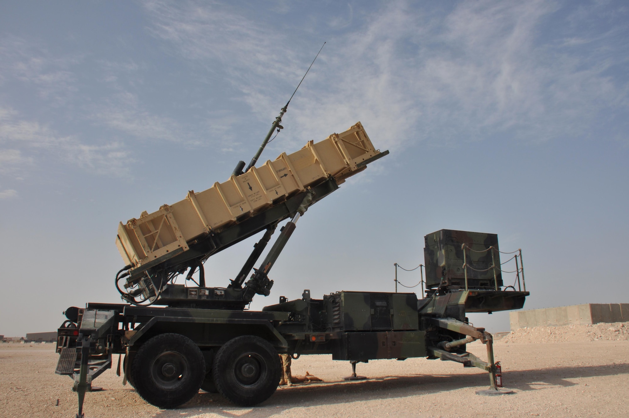A Patriot PAC-2 missile battery prepares to move into the firing position during an exercise at Al Udeid Air Base, Qatar Mar. 4. The Patriot missiles at AUAB protect the base from a variety of airborne threats including tactical ballistic missiles and drones.  (U.S. Air Force photo by Tech. Sgt. James Hodgman/Released)