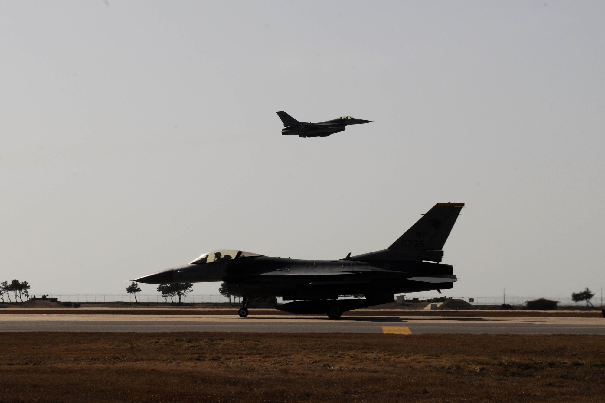 Wolf Pack pilots launch in support of Exercise Beverly Midnight 16-1 at Kunsan Air Base, Republic of Korea, March 9, 2016. The high ops tempo combined with challenging exercise conditions ensured Wolf Pack Airmen are able to execute contingency operations while building confidence and unit cohesion. (U.S. Air Force photo by Senior Airman Dustin King/ Released)