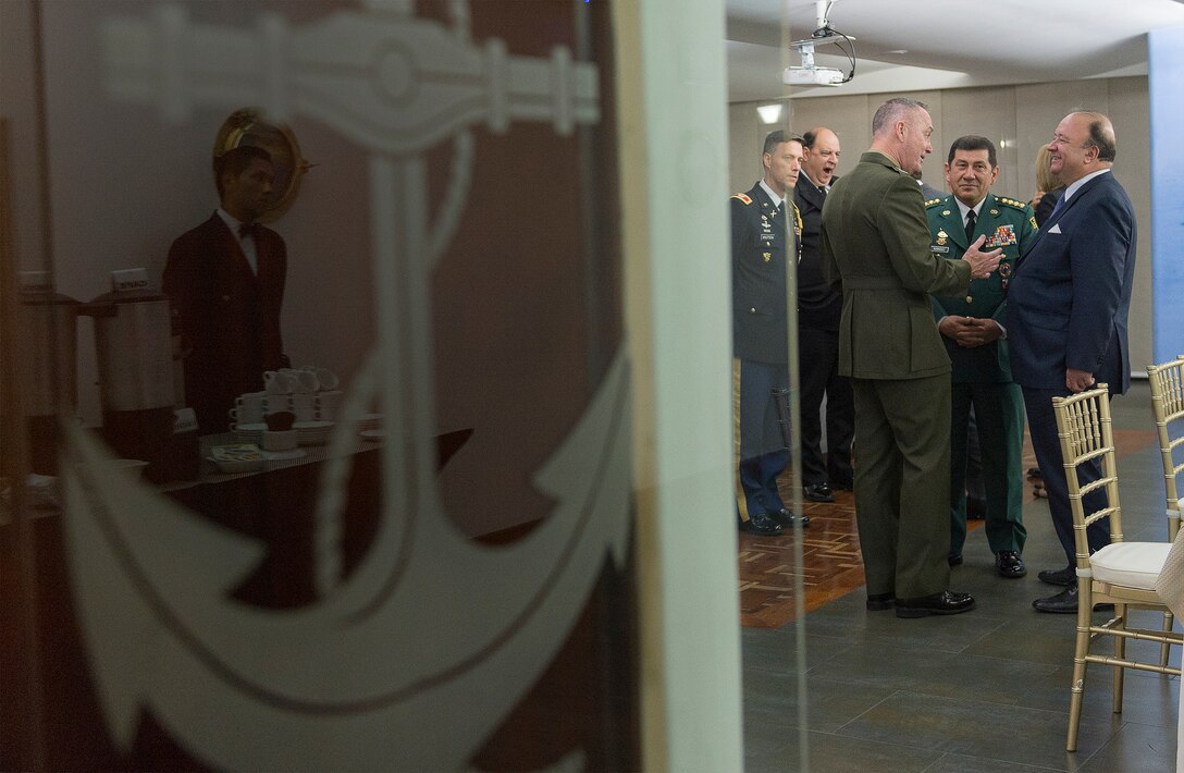 Marine Corps Gen. Joseph F. Dunford Jr., chairman of the Joint Chiefs of Staff, speaks with officials in Bogota, Colombia, March 9, 2016. DoD photo by Navy Petty Officer 2nd Class Dominique A. Pineiro