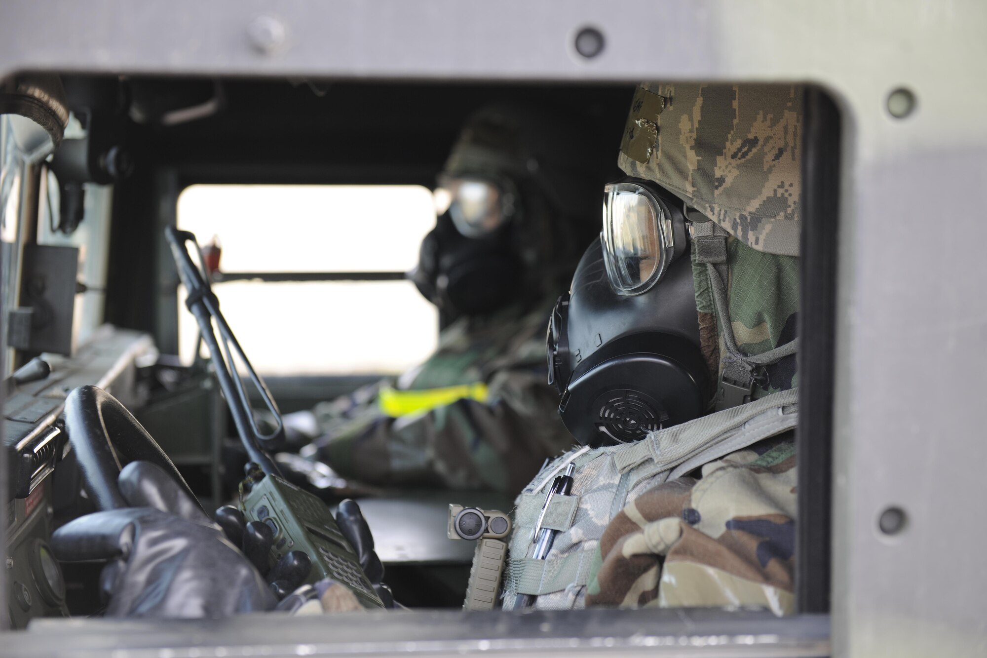 Staff Sgt. Tia Garland, 8th Security Forces Squadron Base Defense Operations Center controller, listens to instructions through the radio while on roaming patrol. Airmen from other career fields are trained to augment security forces personnel when the need for extra security is needed for real-world or exercise operations. (U.S. Air Force photo/Senior Airman Dustin King)