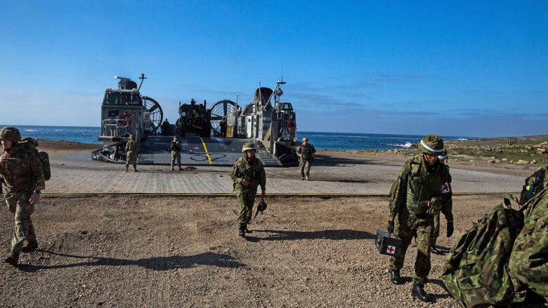 Soldiers with Western Army Infantry Regiment, Japan Ground Self-Defense Force, disembark a landing craft air cushion onto San Clemente Island, California, Feb. 21, 2016, in preparation for the supporting arms coordination center exercise portion of Exercise Iron Fist 2016. Iron Fist is an annual, bilateral amphibious training exercise designed to improve USMC and JGSDF’s ability to plan, communicate and conduct combined amphibious operations at the platoon, company and battalion levels.