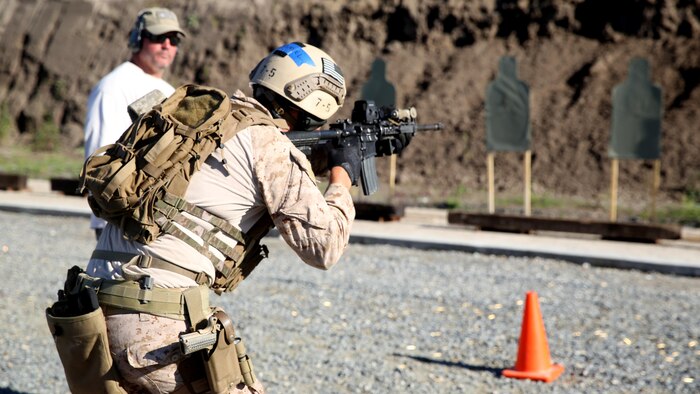 Marines of Company A, 1st Reconnaissance Battalion, 1st Marine Division, conducts target recognition and engagement through a simulated door way during the close quarter marksmanship portion of Close Quarter Battle training at Marine Corps Base Camp Pendleton, California, March 8, 2016. The training focused on room clearing procedures along with close quarter marksmanship in a series of challenging drills. 