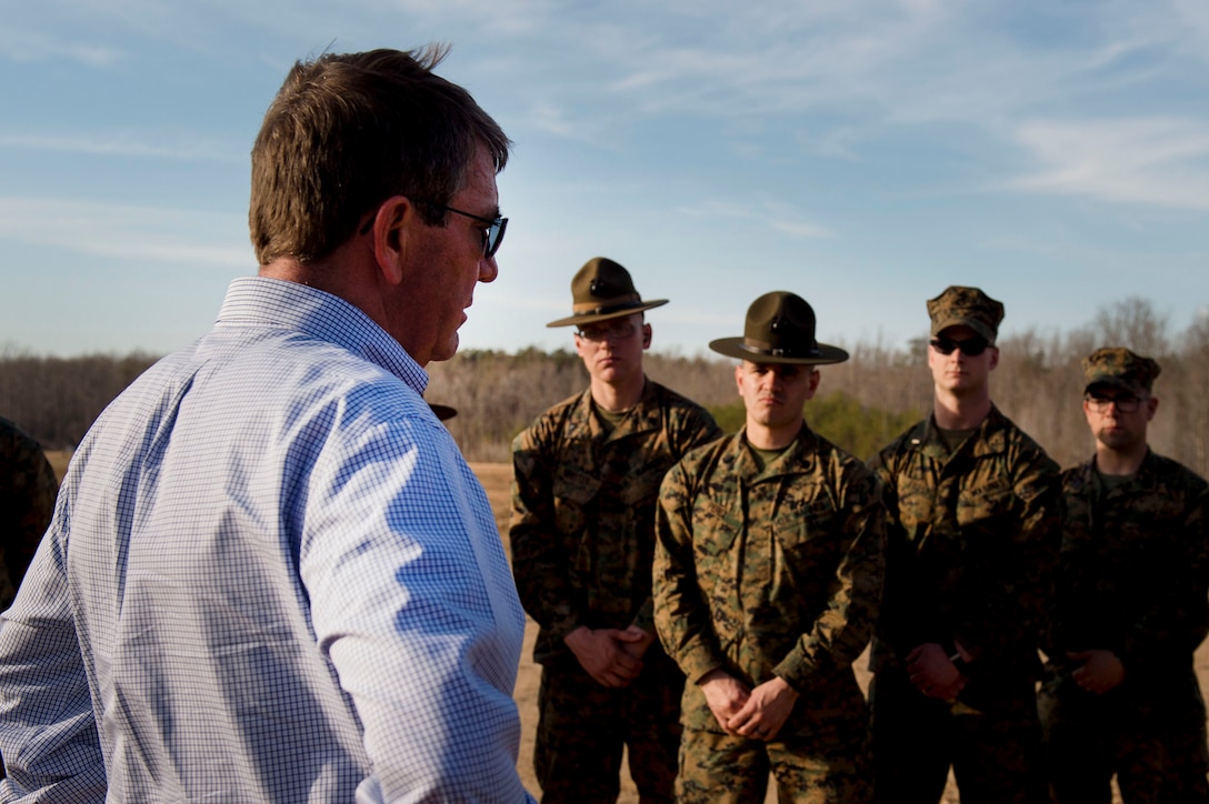 Defense Secretary Ash Carter speaks with Marines and sailors assigned to the Weapons Training Battalion on Marine Corps Base Quantico, Va., March 9, 2016. DoD photo by Air Force Senior Master Sgt. Adrian Cadiz