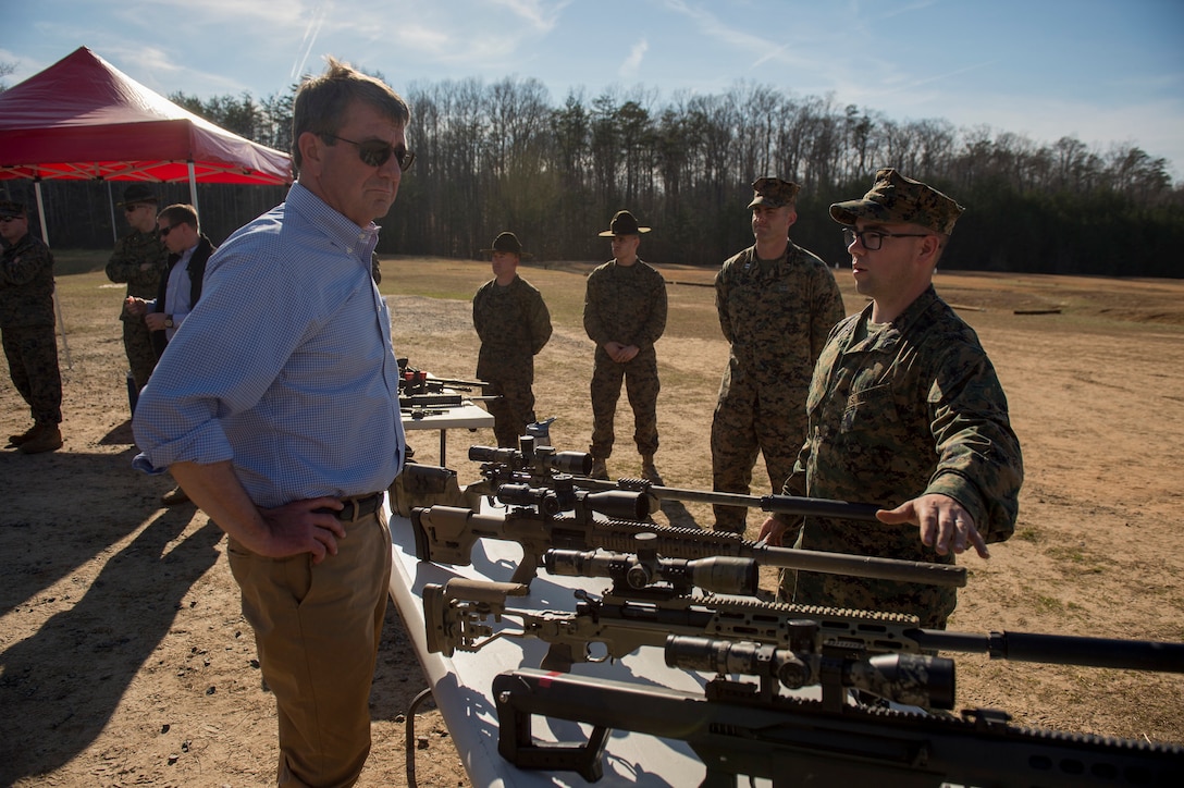 Marines show Defense Secretary Ash Carter the various weapons they use as he tours the Weapons Training Battalion on Marine Corps Base Quantico, Va., March 9, 2016. DoD photo by Air Force Senior Master Sgt. Adrian Cadiz