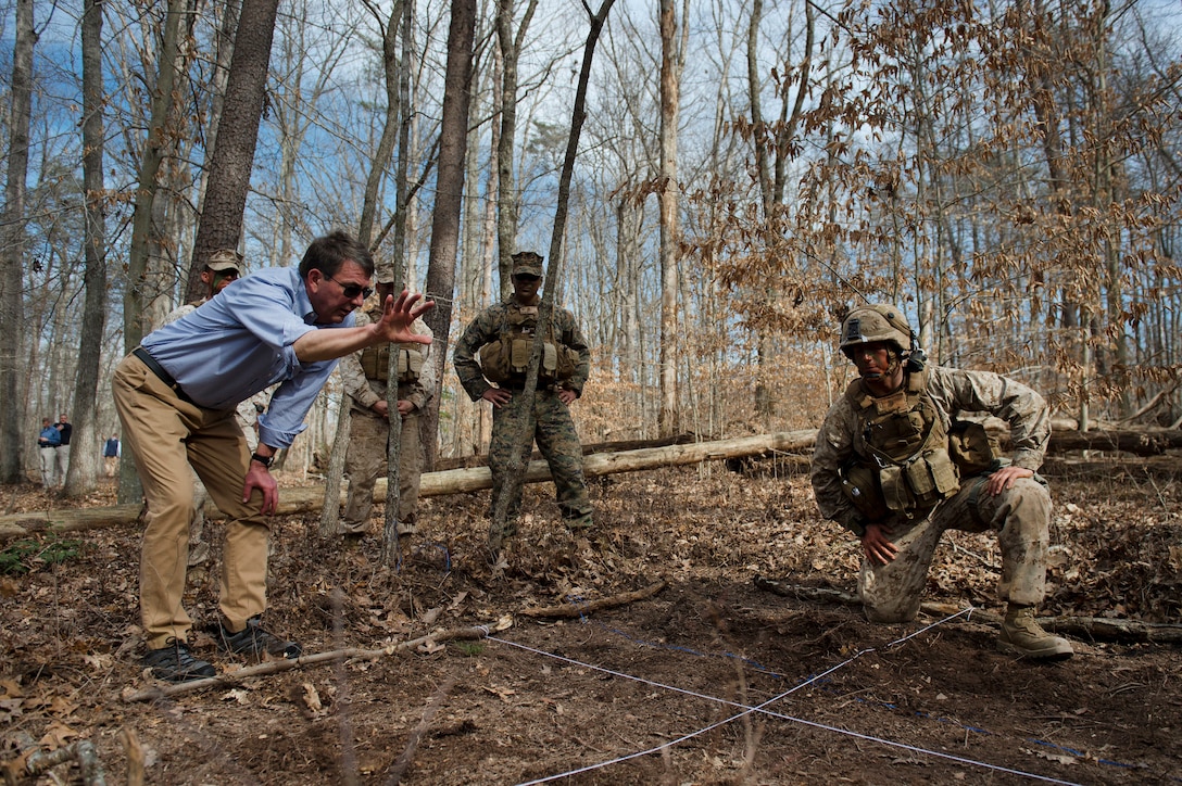 Defense Secretary Ash Carter observes a platoon during a defense demonstration at The Basic School on Marine Corps Base Quantico, Va., March 9, 2016. DoD photo by Air Force Senior Master Sgt. Adrian Cadiz