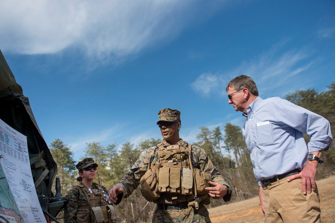 Defense Secretary Ash Carter listens to a briefing on what he will see at The Basic School during a defense demonstration on Marine Corps Base Quantico, Va., March 9, 2016. DoD photo by Air Force Senior Master Sgt. Adrian Cadiz