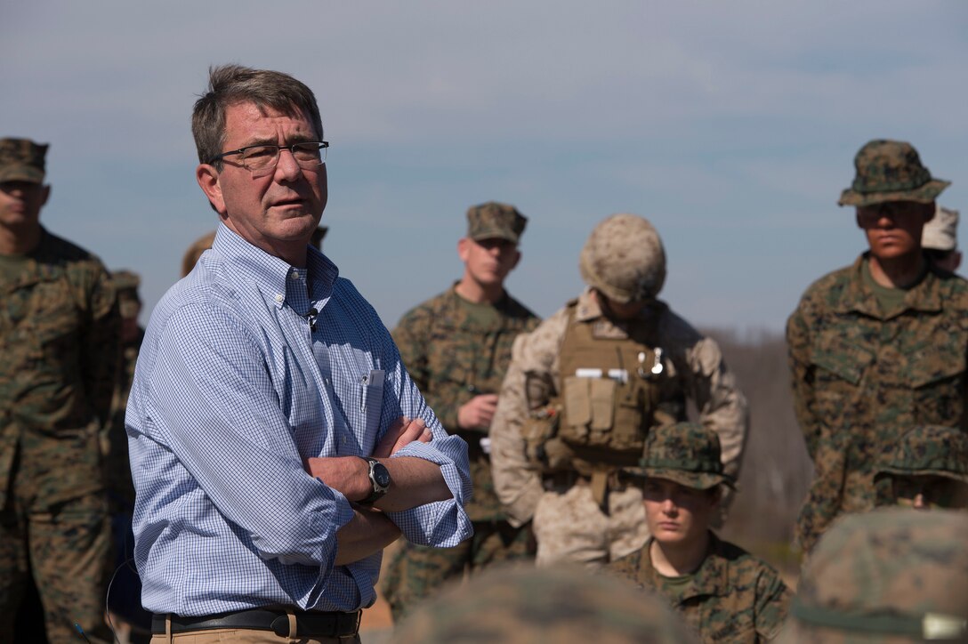 Defense Secretary Ash Carter talks with Marines as they take a break from a squad attack live-fire demonstration on Marine Corps Base Quantico, March 9, 2016. DoD photo by Air Force Senior Master Sgt. Adrian Cadiz
