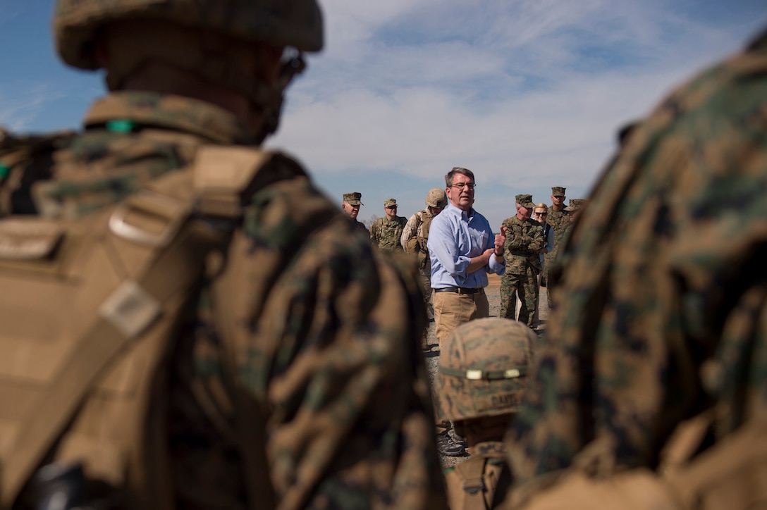 Marines take a break from a squad attack live-fire demonstration to speak with Defense Secretary Ash Carter on Marine Corps Base Quantico, March 9, 2016. DoD photo by Air Force Senior Master Sgt. Adrian Cadiz