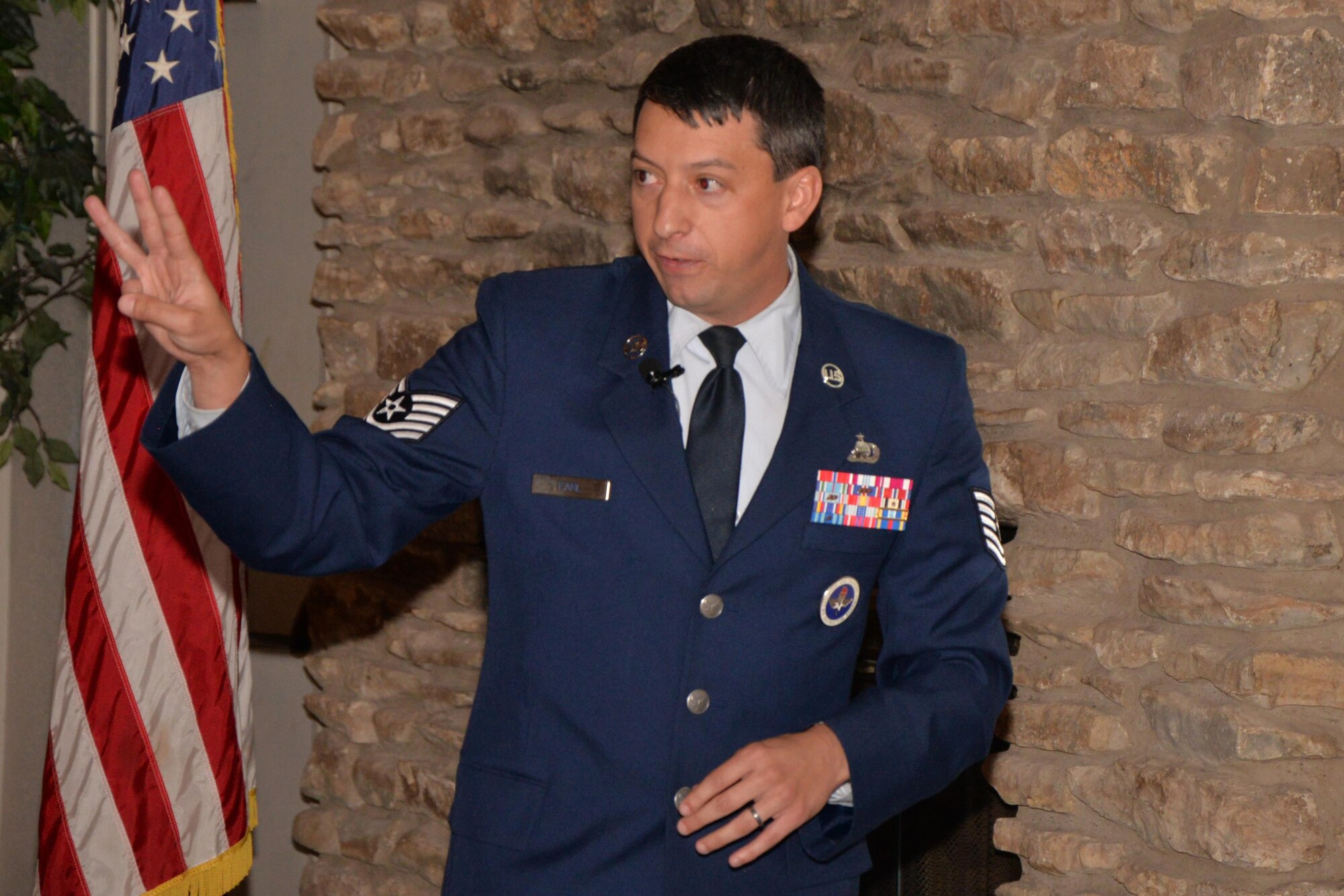 U.S. Air Force Tech. Sgt. Douglas J. Earl, 316th Training Squadon instructor, gives a presentation about Goodfellow Air Force Base at the Bentwood Country Club in San Angelo, Texas, March 9, 2016. The presentation overviews the history of the base, and its relationship with San Angelo. (U.S. Air Force photo by Airman 1st Class Randall A. S. Moose/Released)