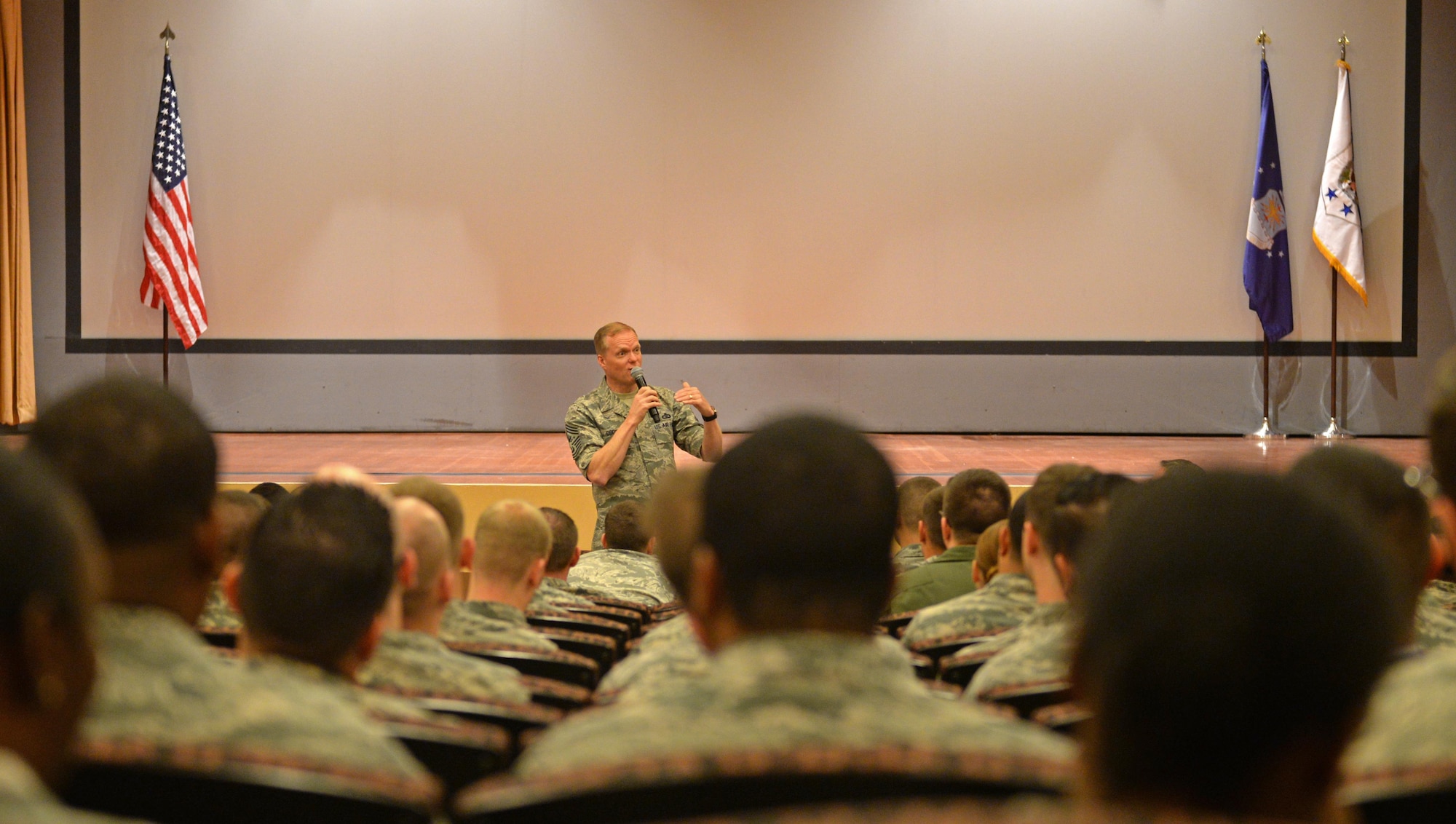 Chief Master Sgt. of the Air Force, James Cody, speaks to Beale Airmen during an all call March 7, 2016, at Beale Air Force Base, California. Airmen had the opportunity to openly ask questions, which included topics such as; enlisted remotely piloted aircraft operators, professional military education and the future outlook of the force. (U.S. Air Force photos by Senior Airman Ramon A. Adelan)