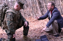 The Joint Infantry Company Prototype (JIC-P) solar panel is the topic of discussion between Marine Capt. Anthony Ripley and Eric South, Naval Surface Warfare Center Dahlgren Division technical lead for JIC-P. While Marines are on break during a march, they can pull out the solar panels and recharge batteries. The system features bionic and solar power enabling Marines and Soldiers to patrol longer without resupply. The Business Intelligence Group (BIG) recently selected JIC-P for the 2016 BIG Innovation Award. BIG awardees are recognized for innovations that are making major impacts in today’s world. Meanwhile, 3,000 business leaders selected the project as a "best of the best" finalist for the 2016 Edison Awards, a program that honors the most innovative new products, services, and business leaders across the globe. Award winners will be announced and ranked on April 21 at the Edison Awards Annual Gala in New York City.