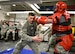 Senior Airman Josh Huber, left, engages in a confrontation with Tech. Sgt. Jason Hutchinson during a full contact training session for the 445th Security Force Squadron during the Feb. 6, 2016 unit training assembly. The combative training is combined with classroom work for the airman to be refreshed on the different levels of escalation and de-escalation while dealing with uncooperative persons.