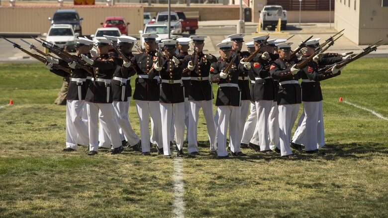 The Marine Corps Silent Drill Platoon of the Battle Color Detachment performs in a Battle Color Ceremony at Marine Corps Air Ground Combat Center Twentynine Palms, California March 9, 2016. The battle color ceremony features the U.S. Marine Drum & Bugle Corps, the Silent Drill Platoon and the Marine Corps Color Guard.