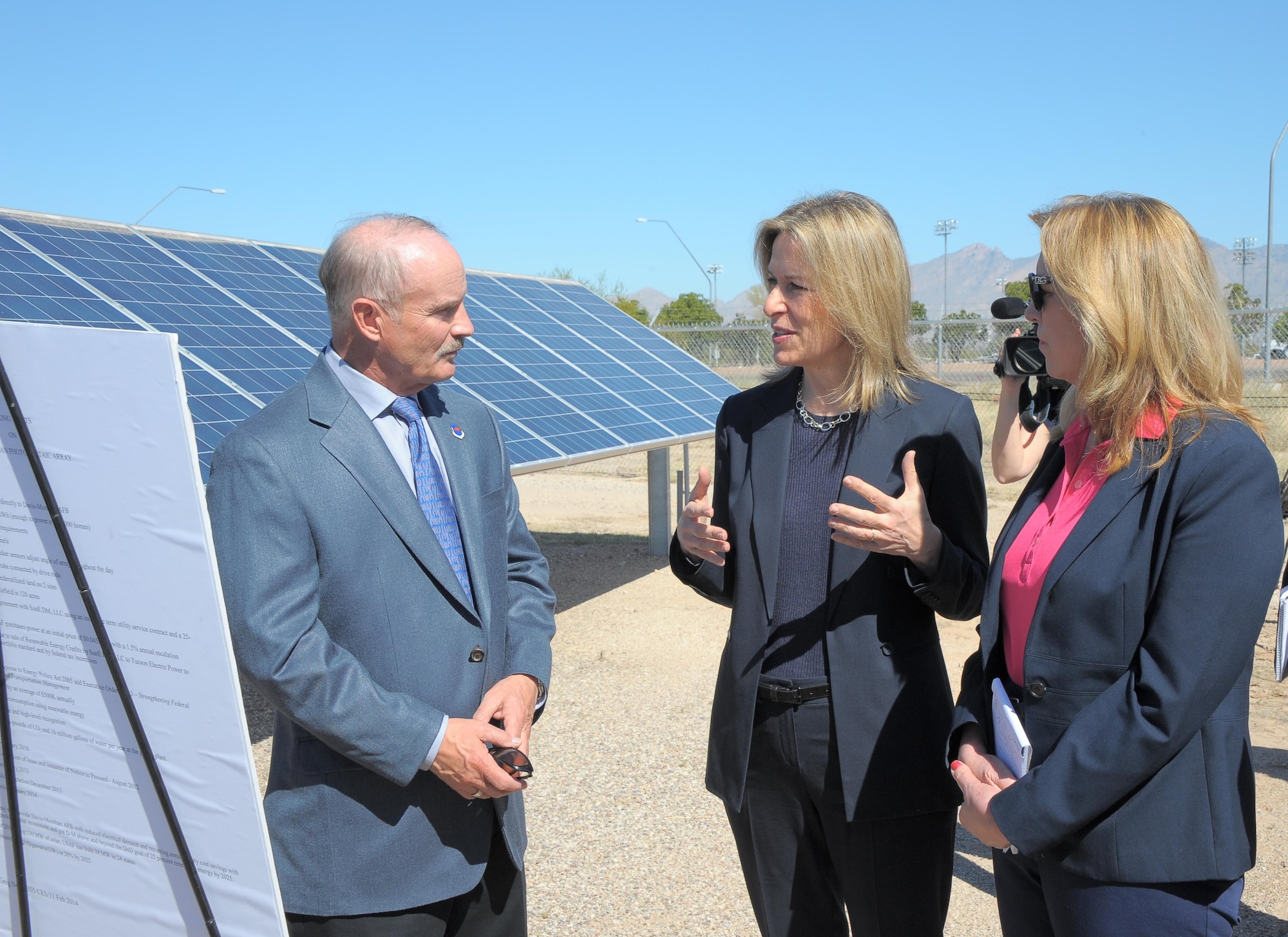 Deputy Secretary of Energy Dr. Elizabeth Sherwood-Randall and Secretary of the Air Force Deborah Lee James speak with Greg Noble, 355th Civil Engineering Squadron base energy manager, at Davis-Monthan Air Force Base, Ariz., March 9, 2016. Noble briefed Sherwood-Randall and James about D-M AFB’s solar array, the 2nd largest in the U.S. Air Force. Sherwood-Randall and James reviewed D-M AFB’s operations and discussed significant contributions to efficient energy use. (U.S. Air Fore photo by Airman 1st Class Mya Crosby/Released)