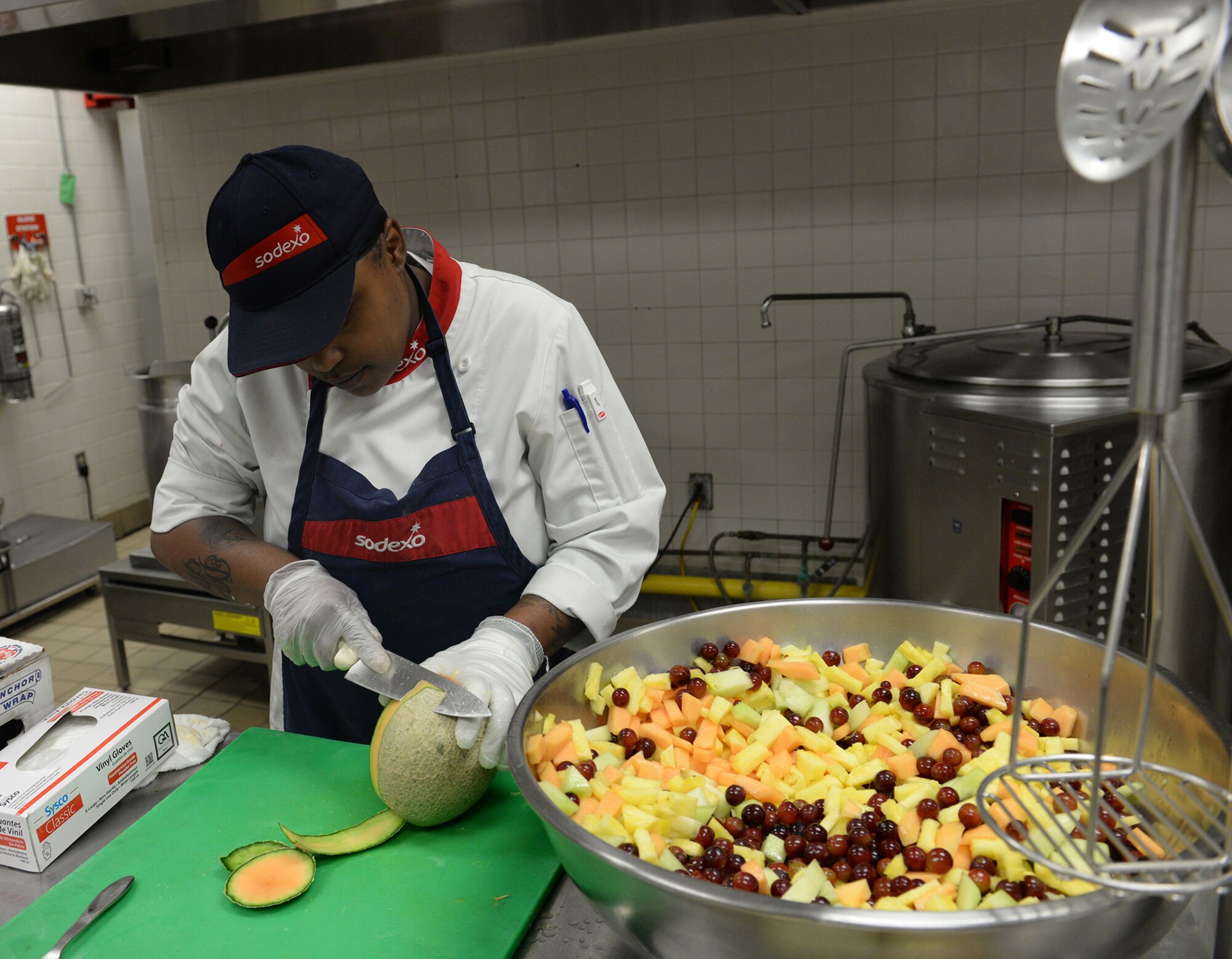 Red River Dining Facility personnel prepare food for Airmen amid flash flood conditions at Barksdale Air Force Base, La., March 9, 2016. (U.S. Air Force photo/Airman 1st Class Curt Beach)