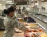 Red River Dining Facility personnel from the 2nd Force Support Squadron served food amid flash flood conditions at Barksdale Air Force Base, La., March 9, 2016. (U.S. Air Force photo/Airman 1st Class Curt Beach)