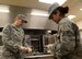 Red River Dining Facility personnel from the 2nd Force Support Squadron prepare meals for Airmen amid flash flood conditions at Barksdale Air Force Base, La., March 9, 2016. (U.S. Air Force photo/Airman 1st Class Curt Beach)