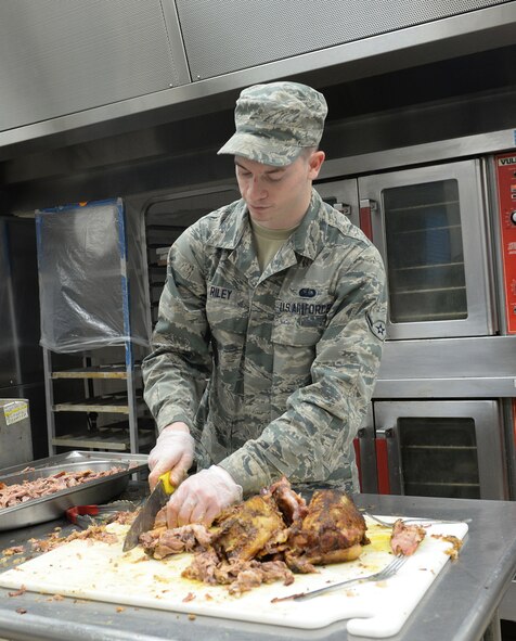 Red River Dining Facility personnel from the 2nd Force Support Squadron worked to ensure Airmen were fed amid flash flood conditions at Barksdale Air Force Base, La., March 9, 2016. (U.S. Air Force photo/Airman 1st Class Curt Beach)