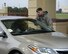 A 2nd Security Forces Squadron defender welcomes a visitor to Barksdale Air Force Base, La., March 10, 2016. (U.S. Air Force photo/ Senior Airman Jannelle Dickey)