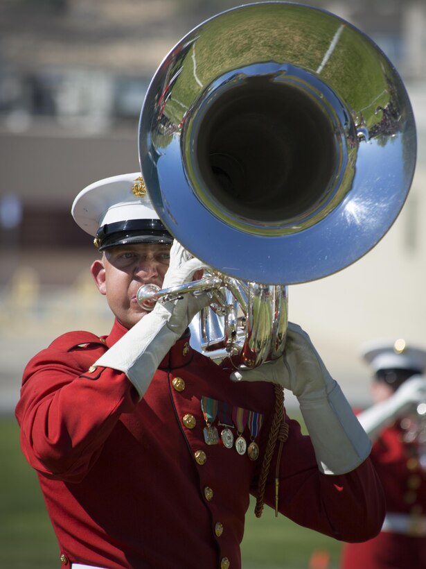 A Marine with U.S. Marine Drum and Bugle Corps, also known as "The Commandant's Own," performs during a Battle Color Ceremony at Lance Cpl. Torrey L. Gray Field March 9, 2016. (Official Marine Corps photo by Lance Cpl. Levi Schultz/Released)