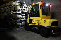 Senior Airman Anthony McGee, 51st Munitions Squadron storage crew chief, performs spotter duties as a BLU-109 bomb is being placed in storage during exercise Beverly Midnight 16-01, Osan Air Base, Korea, March 11, 2016. Both the 25th and 36th Fighter Squadrons rely on the munitions airmen to deliver quality bombs at a moment’s notice. (U.S. Air Force Staff Sgt. Rachelle Coleman/Released)
