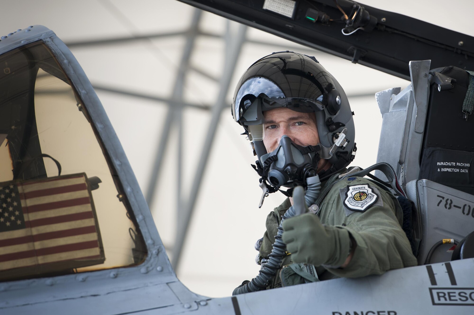 U.S. Air Force Lt. Col. Dustin Ireland, 23d Wing director of staff, signals a thumbs up prior to participating in the East Coast Air Power Demonstration, March 4, 2016, at Moody Air Force Base, Ga. The East Coast Air Power Demonstration allowed the delegation to spend the day with Airmen and get a firsthand look at the mission, capabilities and platforms that the Air Force provides to combatant commanders in support of global operations. (U.S. Air Force photo by Airman 1st Class Kathleen Bryant/Released)

