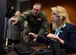 Air Force Secretary Deborah Lee James receives instruction from Lt. Col. Rhett Hierlmeier, the 56th Training Squadron director of operations, on a flight simulator March 10, 2016, at Luke Air Force Base, Ariz. James toured the Academic Training Center and received briefings on the progress of F-35 Lightning II operations, pilot training and simulators. (U.S. Air Force photo/Senior Airman Devante Williams)