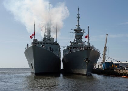 The Athabaskan (left) and The Charlottetown, Royal Canadian Navy vessels,
moored in Charleston S.C. after completing an exercise with the USS Farragut,
a U.S. Navy destroyer whose homeport is Naval Station Mayport, Florida. USS
Farragut was greeted by members of Joint Base Charleston leadership upon
arrival. While visiting, the ship will provide training opportunities to
students attending The Citadel, the military college of S.C. (U.S. Air Force
photo/Staff Sgt. Jared Trimarchi)