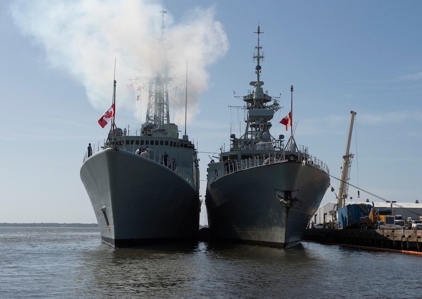 The Athabaskan (left) and The Charlottetown, Royal Canadian Navy vessels,
moored in Charleston S.C. after completing an exercise with the USS Farragut,
a U.S. Navy destroyer whose homeport is Naval Station Mayport, Florida. USS
Farragut was greeted by members of Joint Base Charleston leadership upon
arrival. While visiting, the ship will provide training opportunities to
students attending The Citadel, the military college of S.C. (U.S. Air Force
photo/Staff Sgt. Jared Trimarchi)
