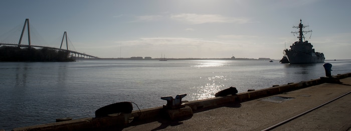 The USS Farragut, a U.S. Navy destroyer whose homeport is Naval Station
Mayport, Florida, is guided by a tug boat before docking in Charleston, South
Carolina, March 10, 2016 after completing an exercise near the Atlantic Coast.
Joint Base Charleston leadership greeted the ship upon arrival. While
visiting, the ship will provide training opportunities to students attending
The Citadel, the military college of S.C. (U.S. Air Force photo/Staff Sgt.
Jared Trimarchi)
