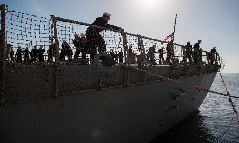 Sailors aboard the USS Farragut, a U.S. Navy destroyer whose homeport is Naval
Station Mayport, Florida, handle the lines during the docking process in
Charleston, South Carolina, March 10, 2016 after completing an exercise near
the Atlantic Coast.. Joint Base Charleston leadership greeted the ship upon
arrival. While visiting, the ship will provide training opportunities to
students attending The Citadel, the military college of S.C., (U.S. Air Force
photo/Staff Sgt. Jared Trimarchi)

