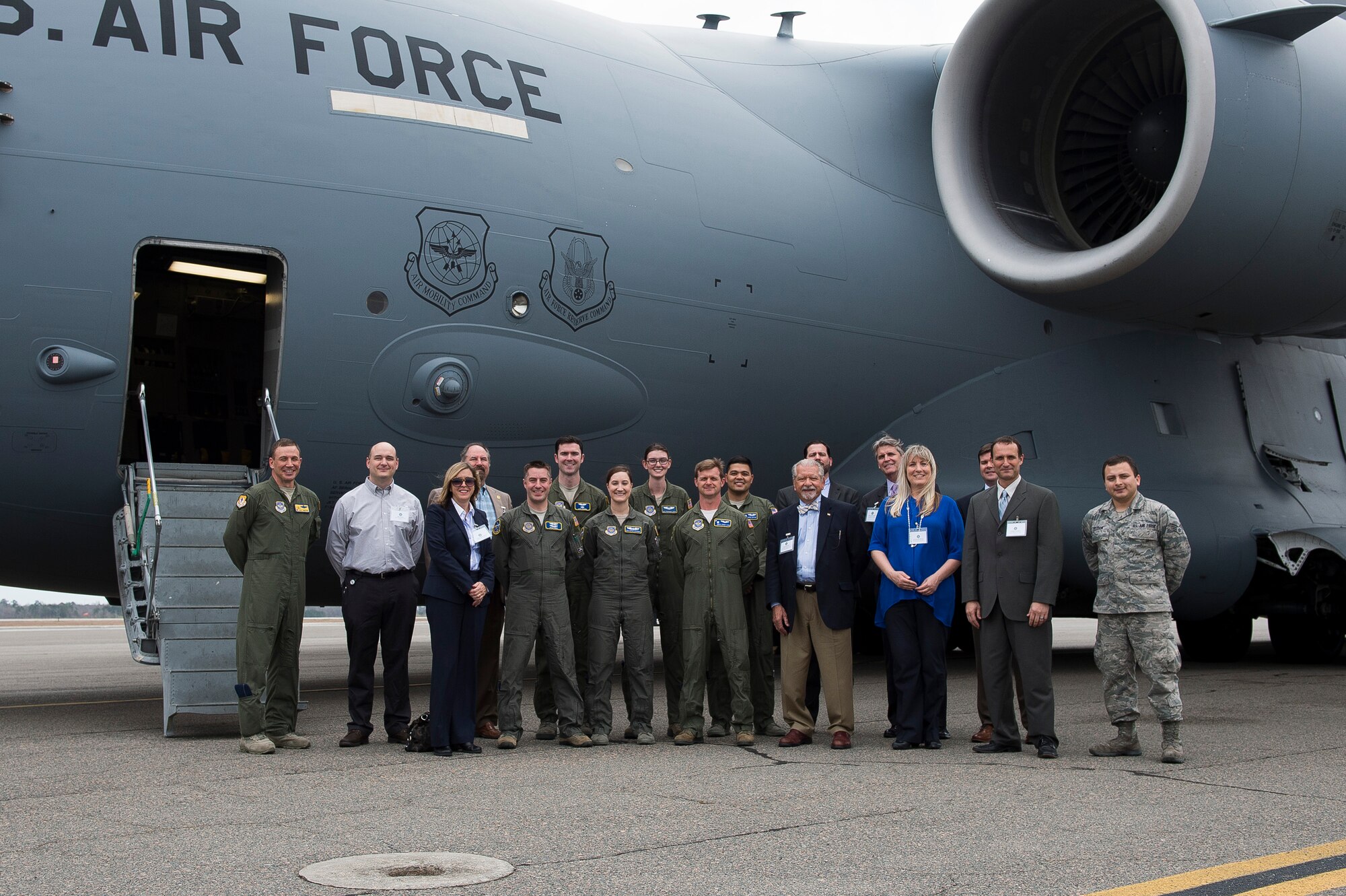 Members of Joint Base Charleston pose for a group photo with newly appointed honorary commanders during the 2016 Honorary Commanders’ Orientation Tour, March 9th, 2016 at Joint Base Charleston – Air Base, S.C. The honorary commanders will get to participate in many joint base events over the course of their tenure, giving them a glimpse into some of the challenges and rewards military members face. (U.S. Air Force photo/Staff Sgt. George Goslin)