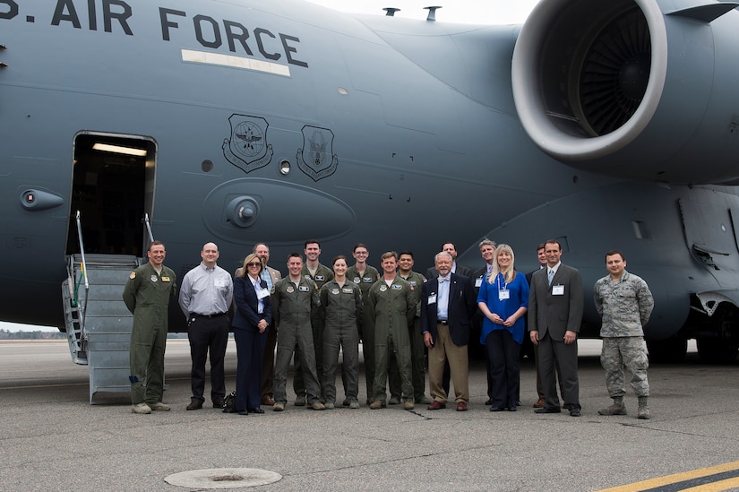 Members of Joint Base Charleston pose for a group photo with newly appointed honorary commanders during the 2016 Honorary Commanders’ Orientation Tour, March 9th, 2016 at Joint Base Charleston – Air Base, S.C. The honorary commanders will get to participate in many joint base events over the course of their tenure, giving them a glimpse into some of the challenges and rewards military members face. (U.S. Air Force photo/Staff Sgt. George Goslin)
