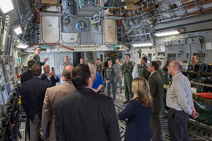 Senior Airman Stephanie Lucas, 14th Airlift Squadron loadmaster, briefs newly appointed honorary commanders on the C-17 Globemaster III’s capabilities during the 2016 Honorary Commanders’ Orientation Tour, March 9th, 2016 at Joint Base Charleston – Air Base, S.C. The tour provided an opportunity for the new honorary commanders to see first-hand what happens on a military installation, specifically Joint Base Charleston. (U.S. Air Force photo/Staff Sgt. George Goslin)