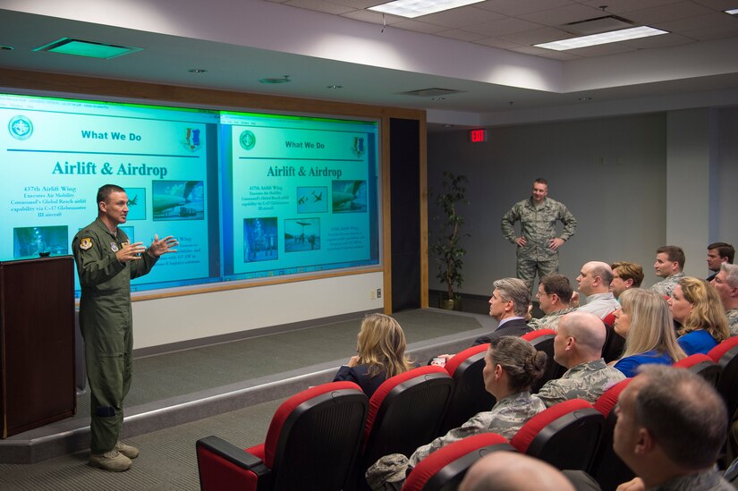 Col. John Lamontagne, 437th Airlift Wing commander, and Col. Rob Lyman, Joint Base Charleston commander, brief newly appointed honorary commanders during the 2016 Honorary Commanders’ Orientation Tour, March 9th, 2016 at Joint Base Charleston – Air Base, S.C. The Honorary Commanders program serves as a way to build relations between the military and local community leaders. Fifteen new honorary commanders were selected to join this year. (U.S. Air Force photo/Staff Sgt. George Goslin) 