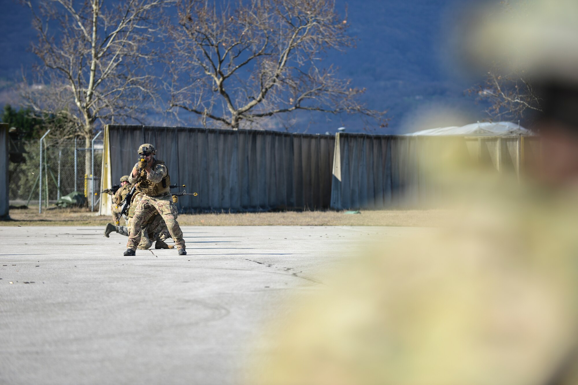 Airman 1st Class Taylor Tompkins, 31st Civil Engineer Squadron Explosive Ordinance Disposal journeyman, participates in small unit tactics training March 1, 2015, at Aviano Air Base, Italy. EOD is a joint force specialty and operators may be tasked to support other Department of Defense services as well as NATO allies in combat. (U.S. Air Force photo by Airman 1st Class Cory W. Bush/Released)