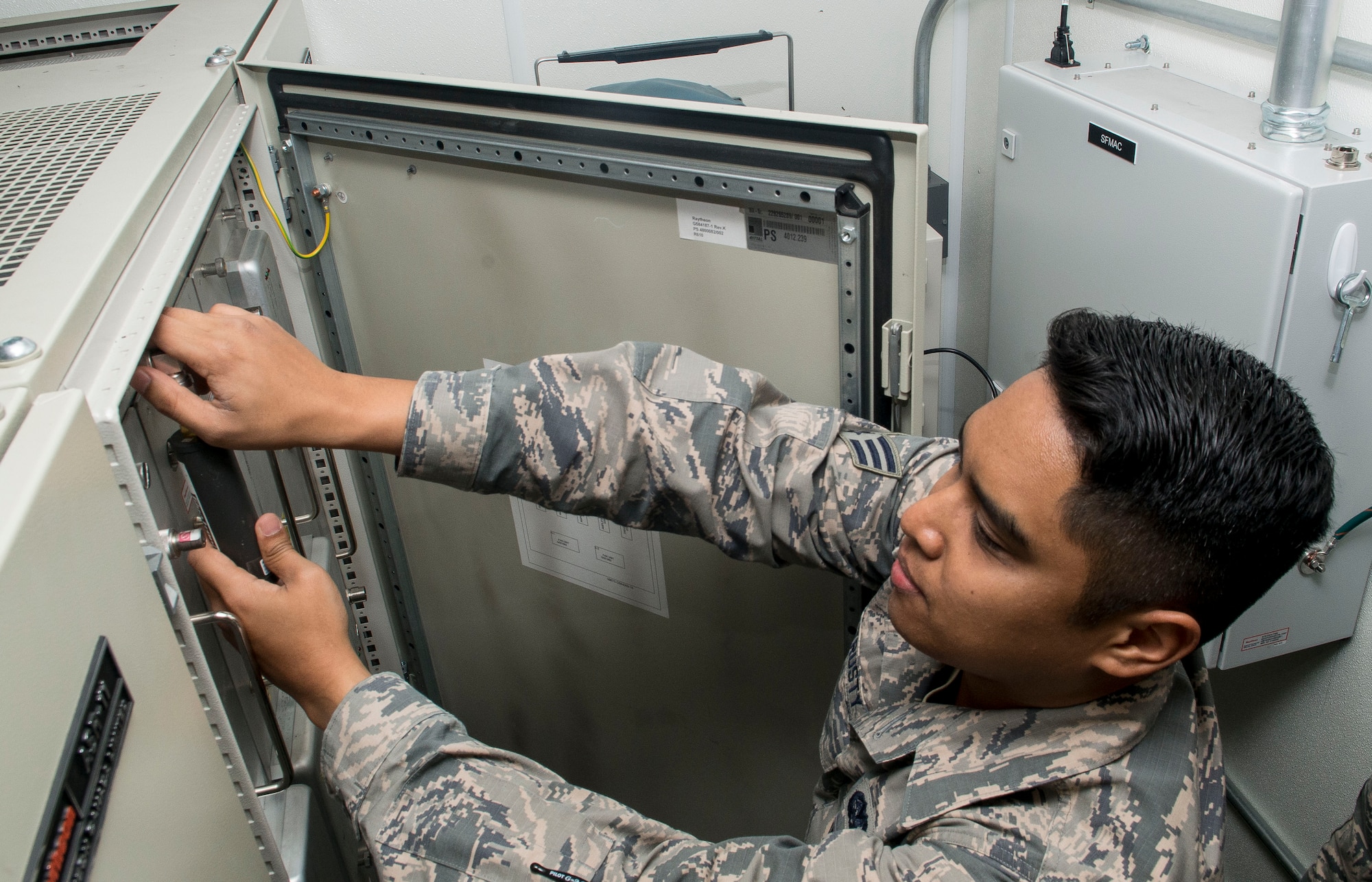 U.S. Air Force Senior Airman Mark Trusty, 39th Operations Support Squadron ground radar technician verifies power output of the primary surveillance radar Feb. 22, 2016, at Incirlik Air Base, Turkey. Trusty is one of eight Airmen assigned to the ground radar unit. (U.S. Air Force photo by Staff Sgt. Eboni Reams/Released)