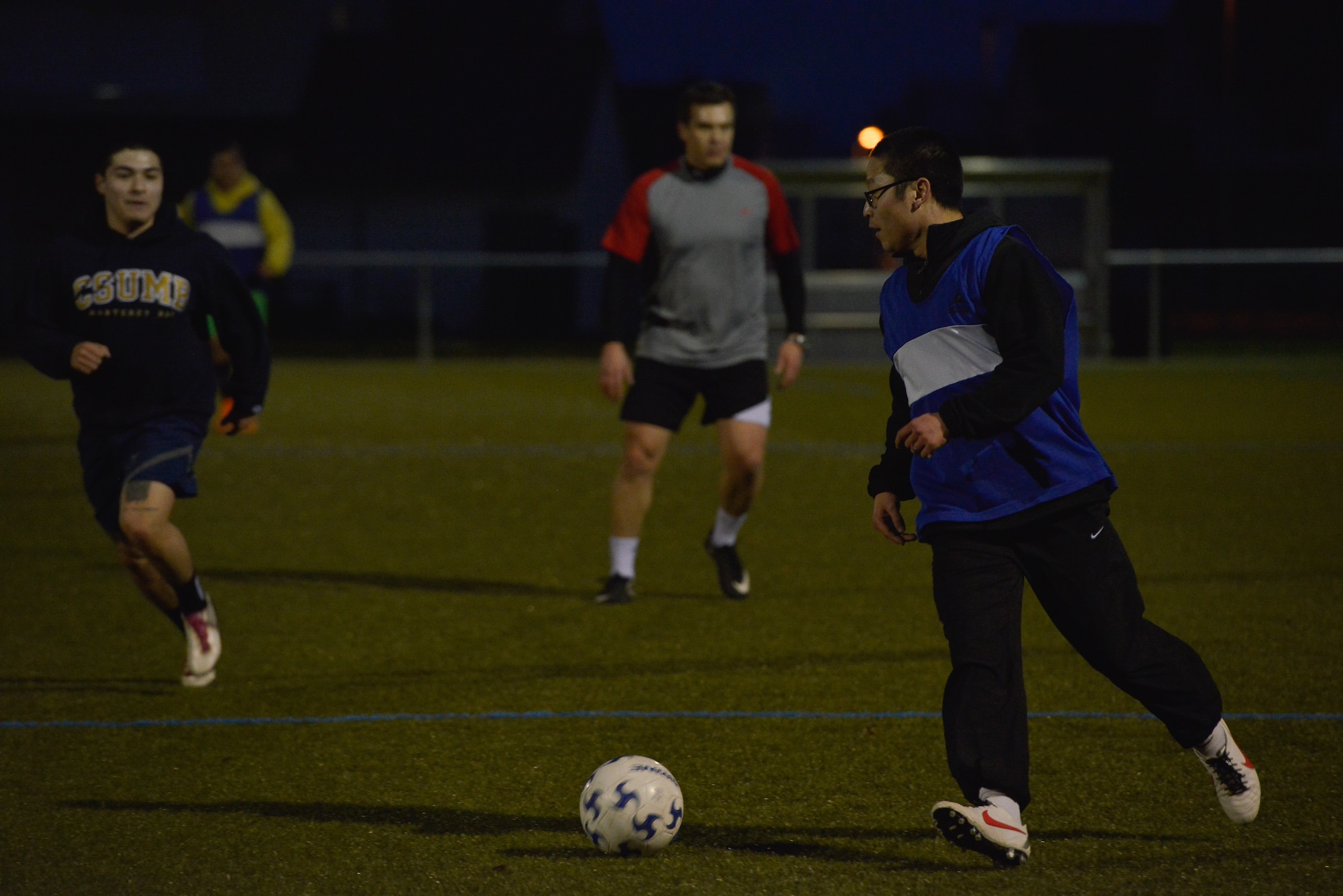 A local soccer team in Wiesbaden Air Field, Army post, plays a possession-training regimen during a soccer practice session Mar. 3, 2016, at U.S. Army Garrison Wiesbaden, Germany. The team is led by their coach, 1st Lt. Sean Miller, 7th Weather Squadron chief of education and training, who stresses a confident passing game to add fluidity to the game. (U.S. Air force photo/Airman 1st Class Lane T. Plummer)