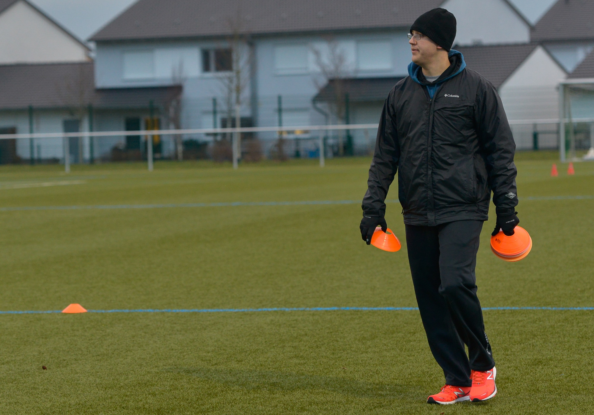 First Lt. Sean Miller, 7th Weather Squadron chief of education and training, prepares a soccer field for a practice session Mar. 3, 2016, at U.S. Army Garrison Wiesbaden, Germany. Miller, a coach for a local Wiesbaden team, adjusts his practice regiments based on his players’ performances using detailed analyses of their prior games and practices. (U.S. Air force photo/Airman 1st Class Lane T. Plummer)