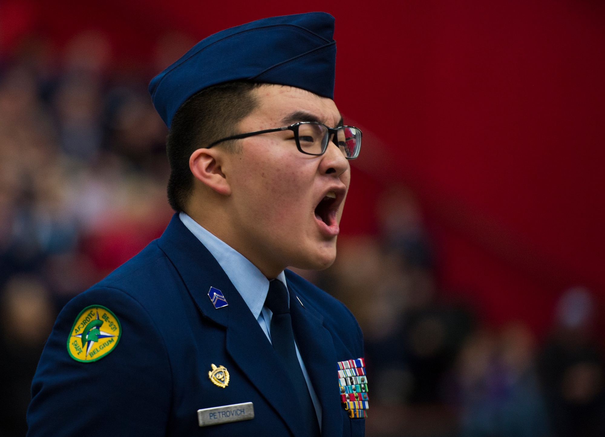 John Petrovich, Supreme Headquarters Allied Powers Europe High School junior ROTC cadet, gives commands to his unit during the annual Department of Defense Education Activity Europe drill team championship held on Vogelweh, Germany, March 5, 2016. Approximately 100 cadets from 11 junior ROTC from across Europe gathered at Kaiserslautern High School to compete in the annual event. (U.S. Air Force photo Senior Airman Jonathan Stefanko)