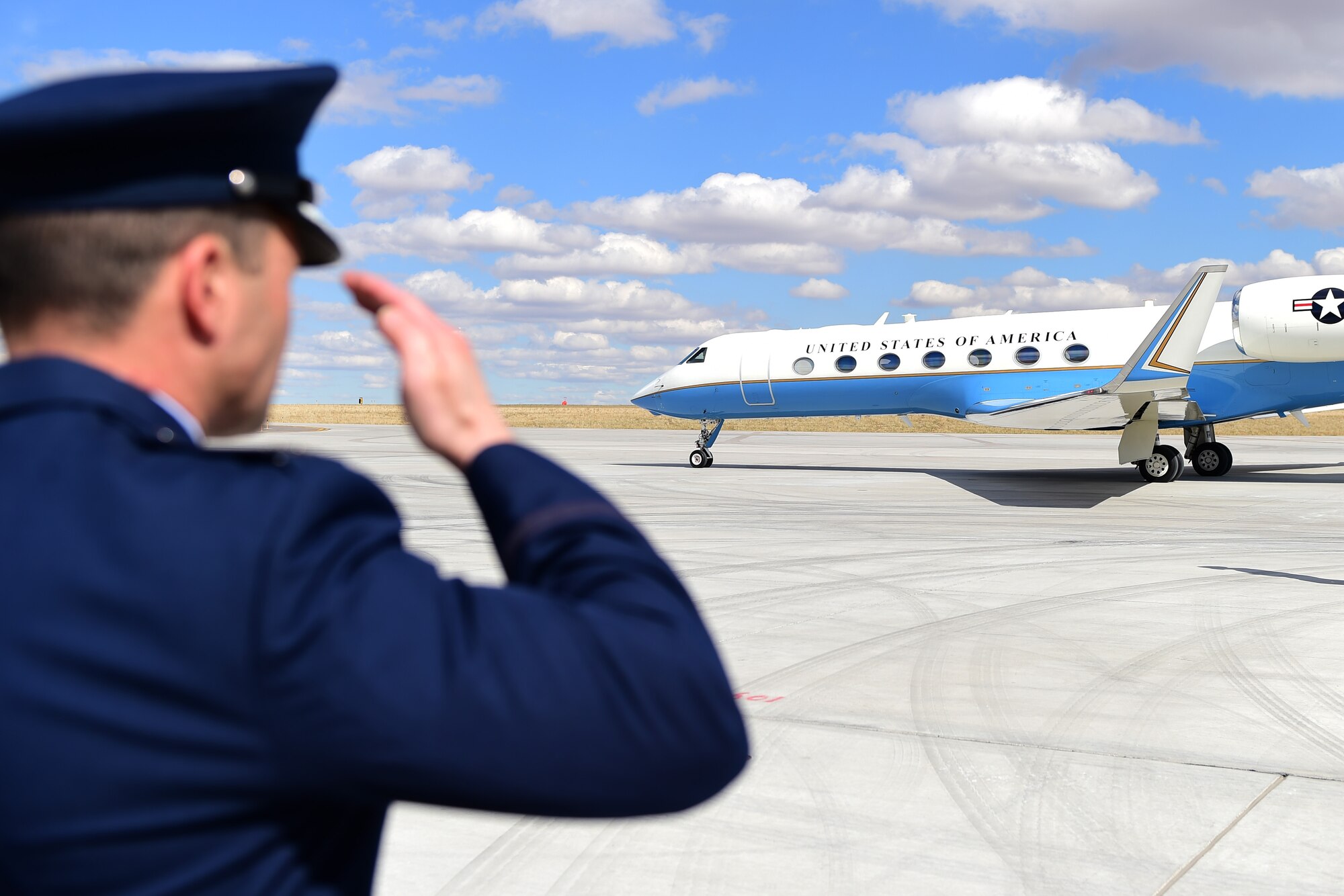 Col. John Wagner, 460th Space Wing commander, salutes as Deborah Lee James, Secretary of the Air Force, departs March 8, 2016, on Buckley Air Force Base, Colo. James visited the Aurora area to attend a meeting with Department of Defense and industry leaders. (U.S. Air Force photo by Senior Airman Racheal E. Watson/Released)